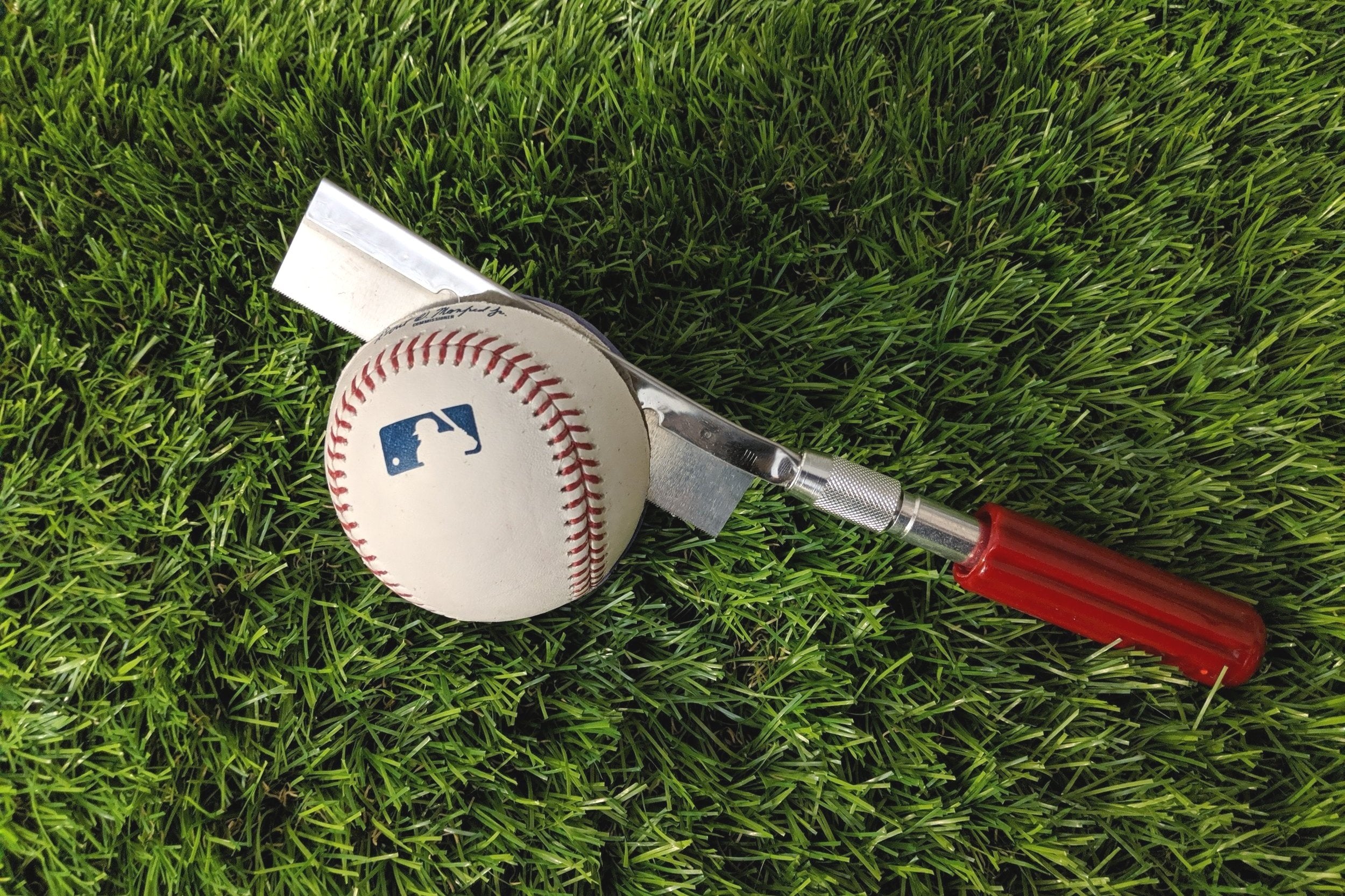 Baseball and cutting tool used for making baseball jewelry