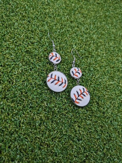 Double Play Earrings- Orange/Black Stitches